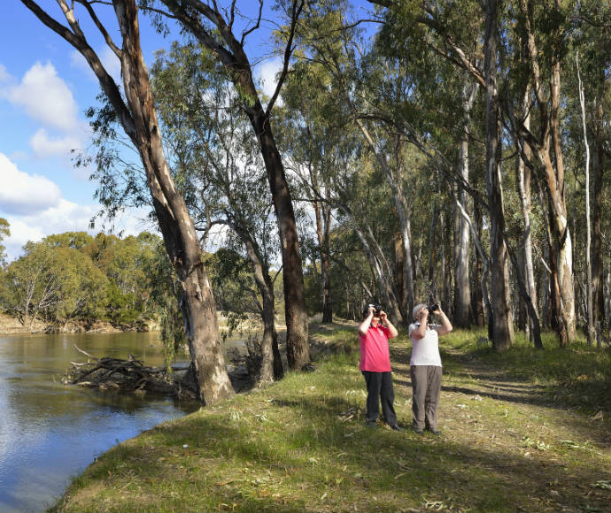 Two women are birdwatching in the Murrumbidgee Valley National Park